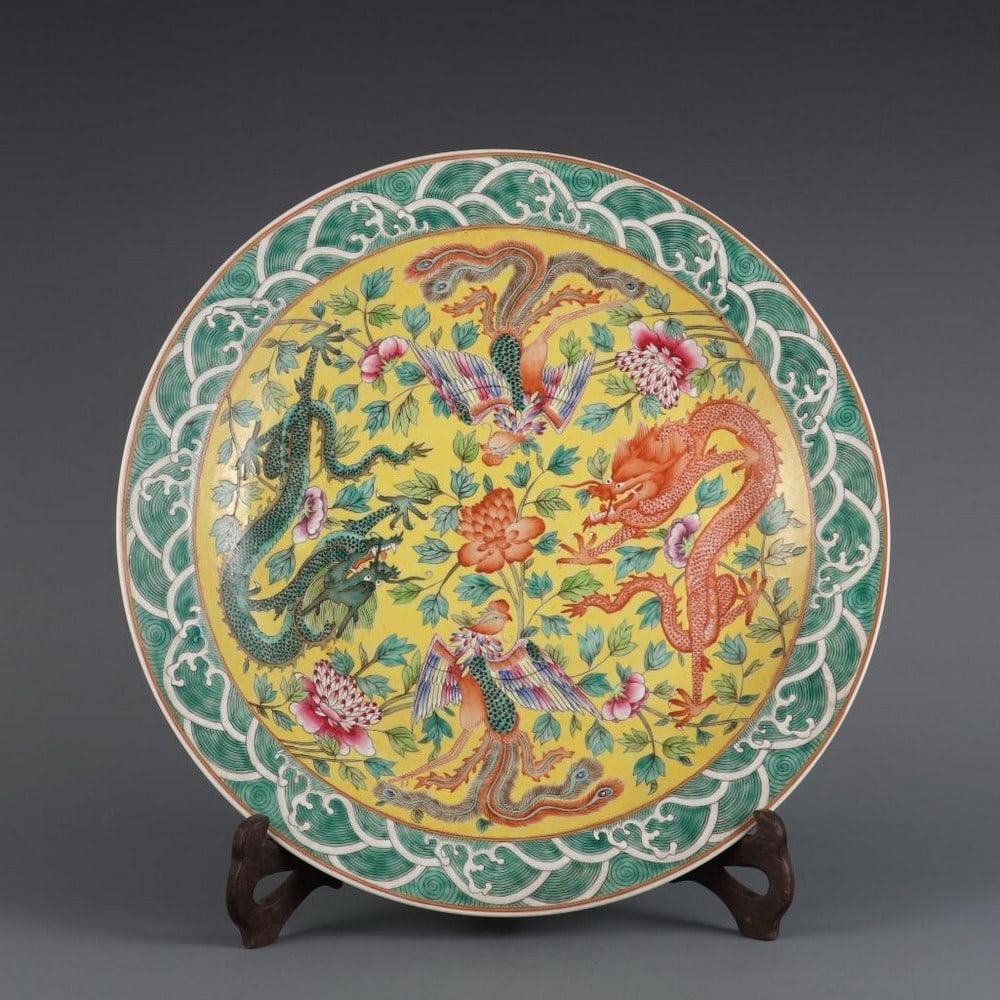 Yellow-Ground Famille Rose Dragon & Phoenix Plate: Yellow-Ground Famille Rose Dragon &; Phoenix Plate This magnificent 37cm famille rose porcelain plate is inspired by the opulence and symbolism of late Qing dynasty imperial wares. Set against a rich 
