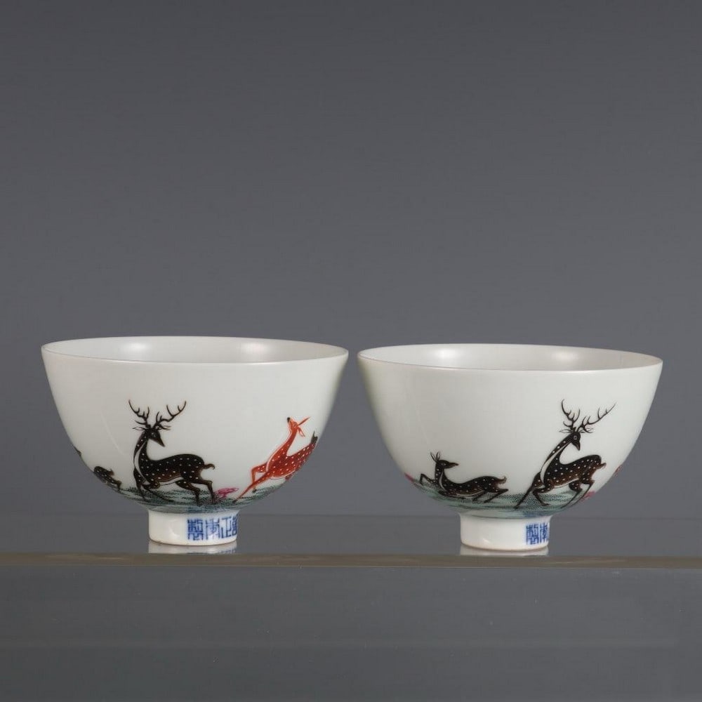 Pair of Famille Rose Fulu' Hat Cups: Pair of Famille Rose Fulu' Hat Cups This elegant pair of famille rose hat-shaped cups showcases a refined blend of symbolic imagery and imperial craftsmanship. Encircling each cup are delicately paint