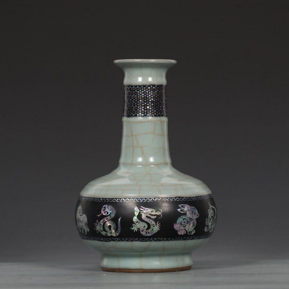 Blue-Glazed Vase with Zodiac Animal Band: Blue-Glazed Vase with Zodiac Animal Band An exceptional vase featuring a refined blue glaze characteristic of high-level court ceramics. The form is elegant and well-proportioned, encircled by finely