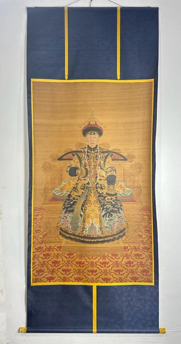 Empress Xiao Shengxian in Court Robes: Empress Xiao Shengxian in Court Robes This exquisite handpainted scroll inspired by Lang Shining, the renowned 18th-century court artist of the Qing dynasty, portrays Empress Xiao Shengxian in full