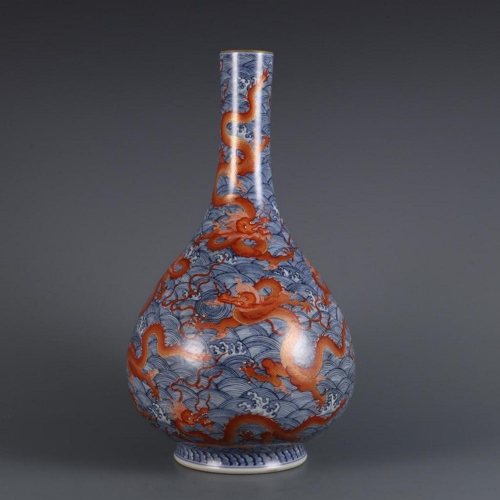 Yongzheng-Inspired Blue And White Nine Dragons Vase: Yongzheng-Inspired Blue And White Nine Dragons Vase. This exquisite vase is inspired by the Qing Dynasty's Yongzheng period (1723 -1735), featuring a striking blue and white design with nine dragons p