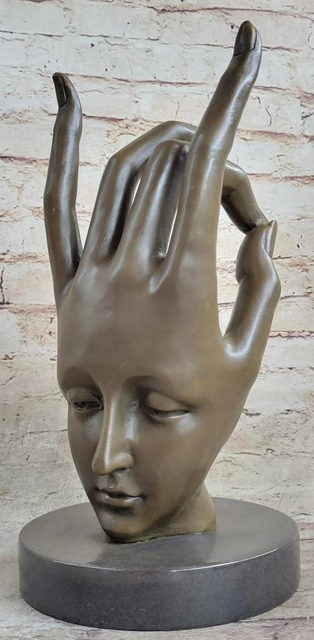 Dali Gesture Hand Brown Patina Inspired Bronze Statue - 12.5'' x 7'': Dali Gesture Hand Brown Patina Inspired Bronze Statue - 12.5" x 7" The Dali Gesture Hand Brown Patina Inspired Bronze Statue is a striking piece of art measuring 12.5 inches in height and 7 in
