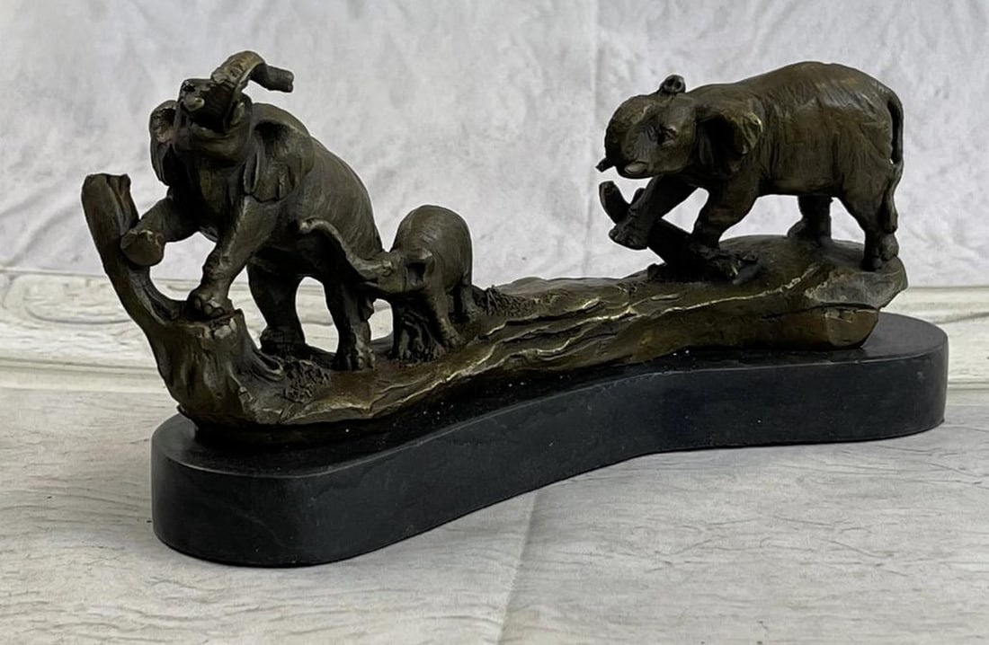 Three Walking Elephants Bronze Sculpture Inspired By Barye - 4'' x 8'': Three Walking Elephants Bronze Sculpture Inspired By Barye - 4" x 8" Some of the few members of an elephant clan can be imagined on the banks of a watering hole in the hot plains of Africa. Re