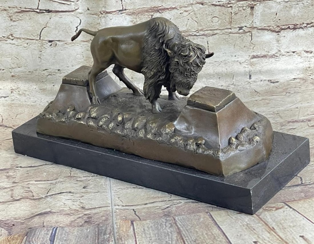 Inspired Large American Buffalo Bronze Sculpture by Russell - 7'' x 13'': Inspired Large American Buffalo Bronze Sculpture by Russell - 7" x 13" The American buffalo, also known as the bison, is a large animal once known to be dangerous to men after the brown bear. 