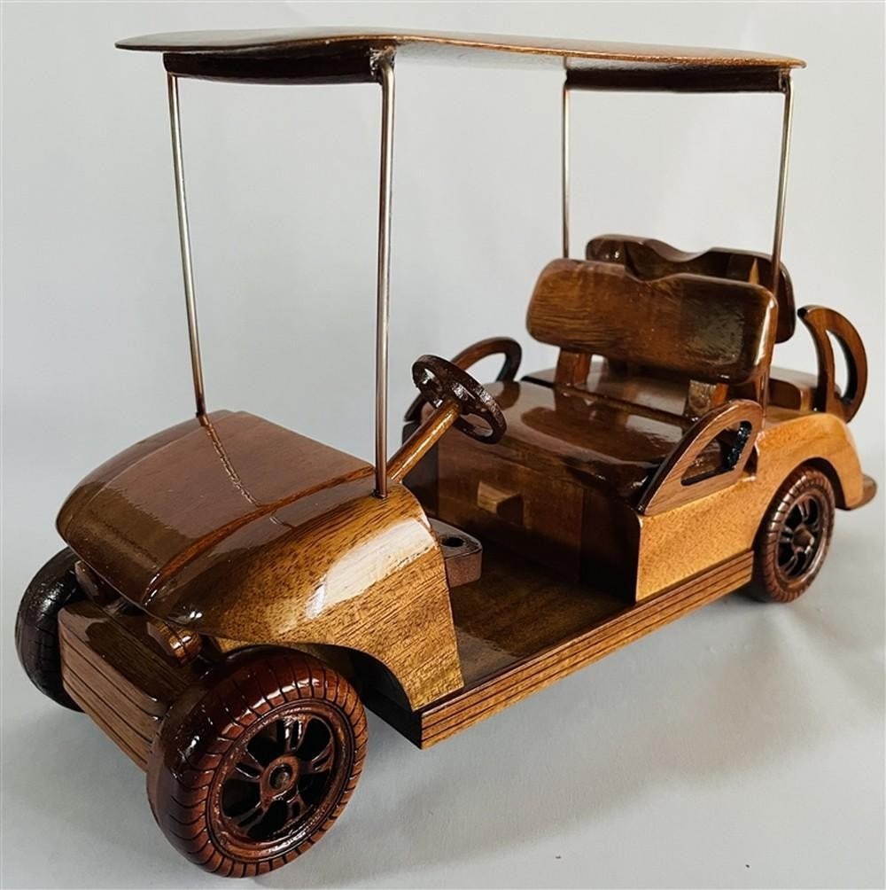 Wooden Golf Cart Model - No Clubs: Wooden Golf Cart Model - No Clubs This beautifully crafted mahogany scale model golf cart serves as a charming reminder that making time for leisure is essential to a balanced and fulfilling life.