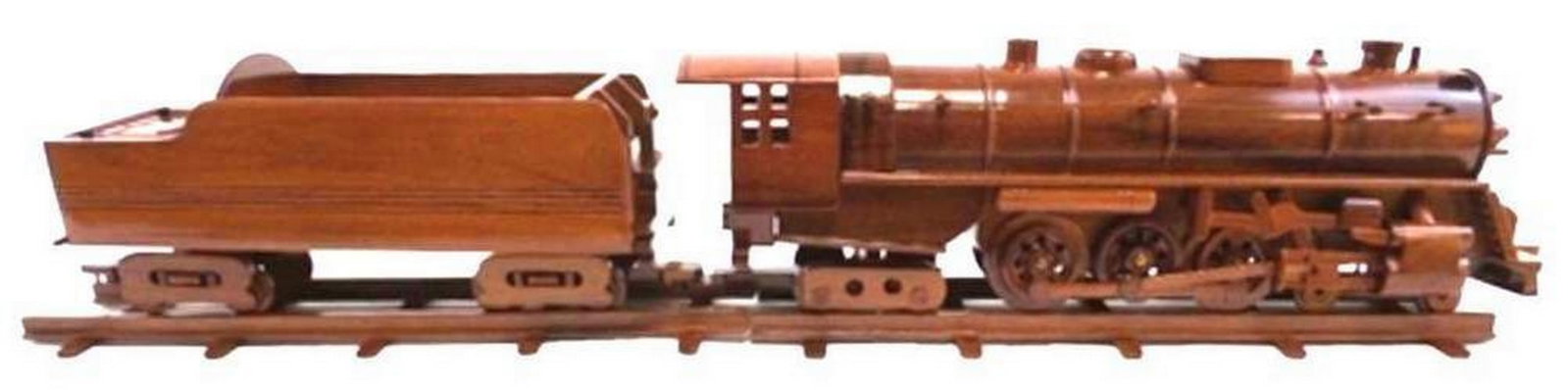 Vintage Steam Train Wood Model: Vintage Stream Train Wood Model A steam locomotive provides the force to move itself by means of the expansion of steam. Water in the boiler of the train is heated by burning combustible material.