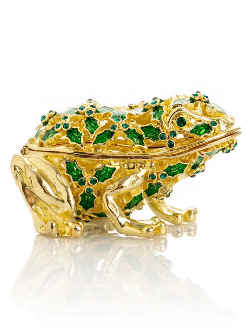 Emerald Frog Enamel Trinket Box: Emerald Frog Enamel Trinket Box This enamel trinket box, hand-painted and adorned with Austrian crystals, is finished with 24K gold plating and features a secure magnetic closure. Each crystal is