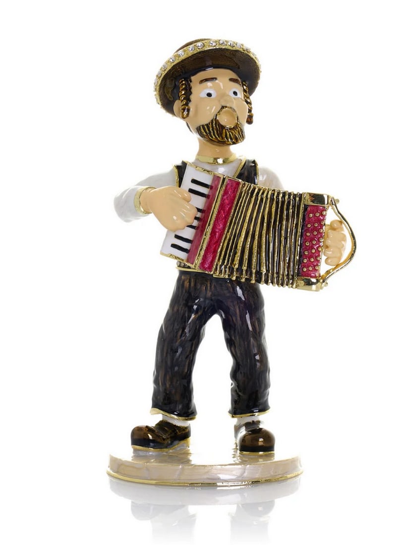 Accordion Player Enamel Trinket Box: Accordion Player Enamel Trinket Box This enamel trinket box, hand-painted and adorned with Austrian crystals, is finished with gold plating and features a secure magnetic closure. Each crystal is