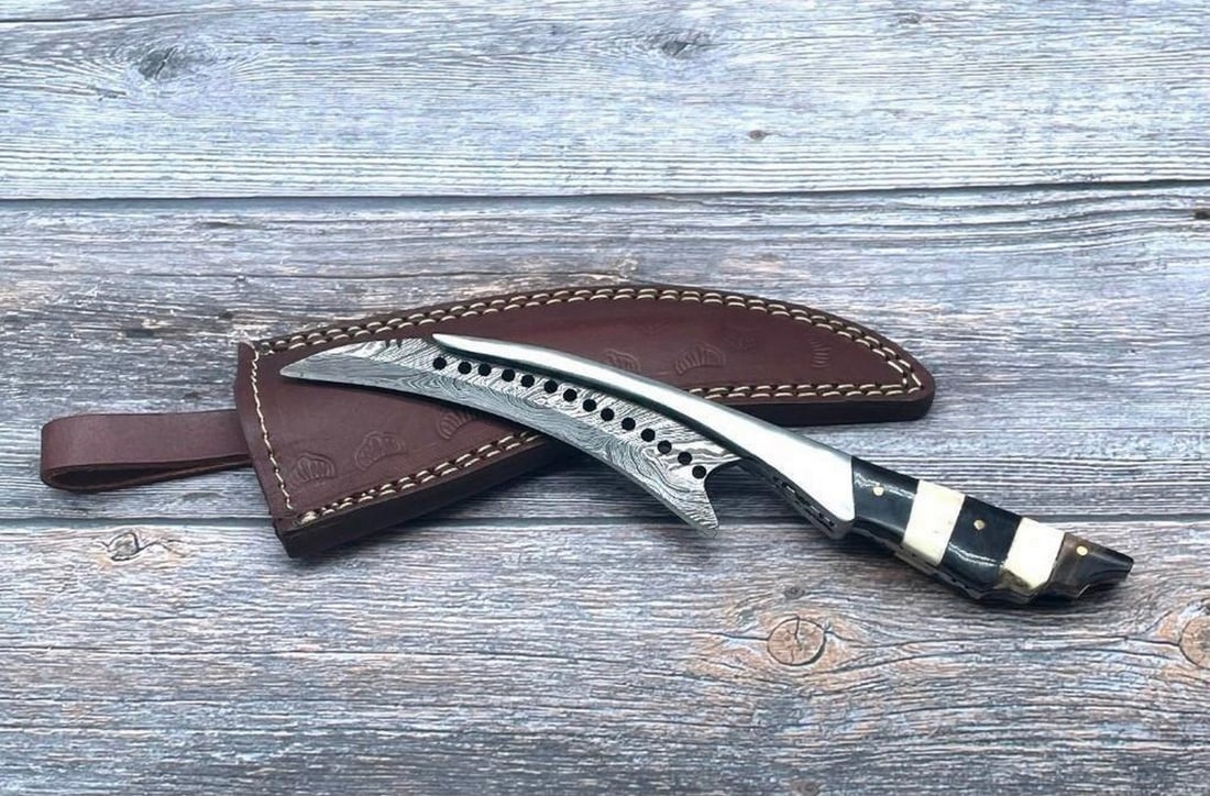 Damascus Full Tang Raptor Talon Blade With Carved Alabaster Handle And Stitched Leather Sheath: 10 Inch Long Damascus Full Tang Raptor Talon Blade With Carved Alabaster Handle And Stitched Leather Sheath. Each blade is created Using 256 Layers Of 1095 and 15N20 High Carbon Steels?????? To Produc
