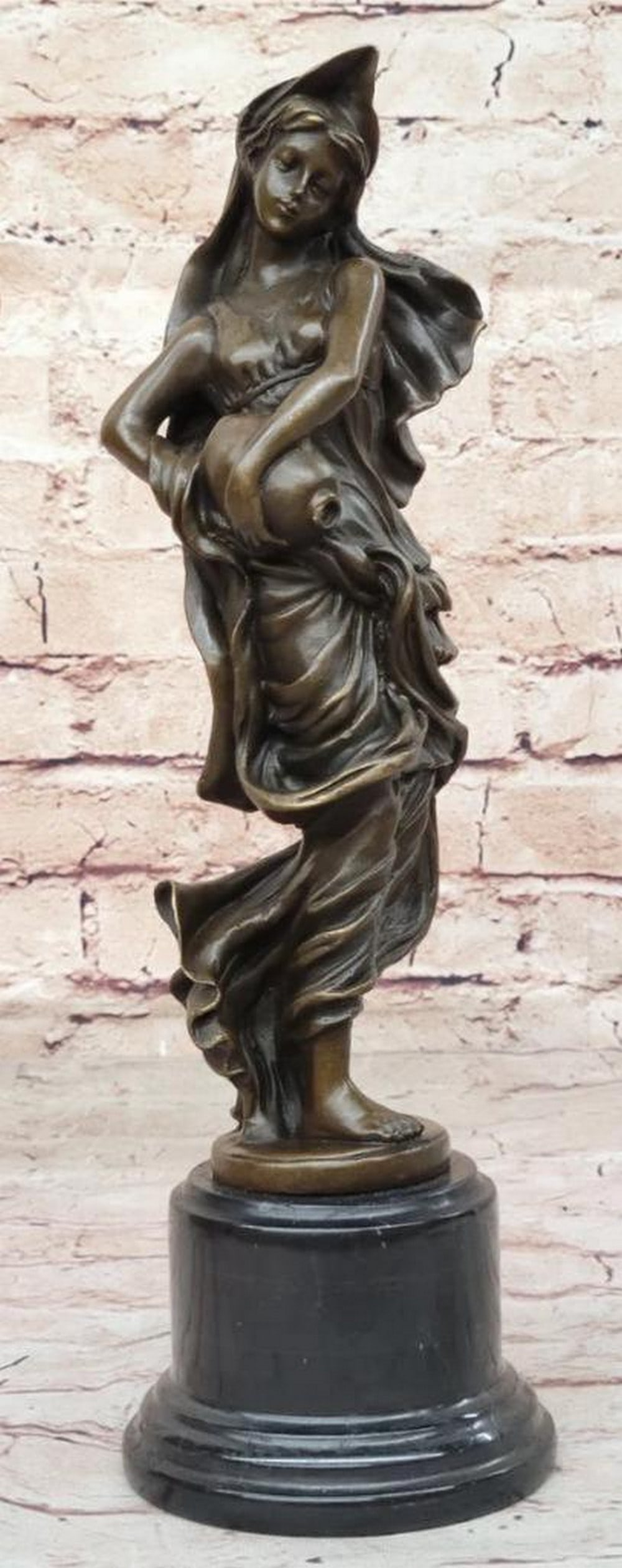 Milo's Original Flowing Aquarius Watercarrier Girl Bronze Sculpture with Jug - 13'' x 4'': Milo s Original Flowing Aquarius Watercarrier Girl Bronze Sculpture with Jug - 13" x 4" In the realm of fine artistry, Milo, a skilled and renowned sculptor, unveils a masterpiece through this