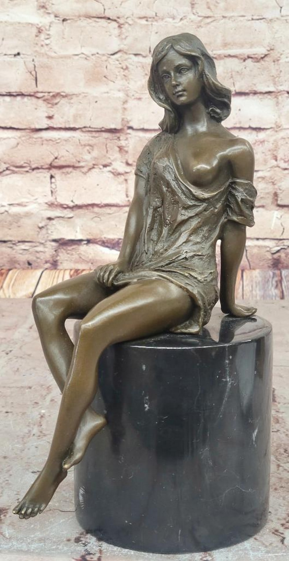 Seated Woman in Contemplation Original Bronze Sculpture by Milo - 11'' x 4.5'': Seated Woman in Contemplation Original Bronze Sculpture by Milo - 11" x 4.5" This elegant bronze sculpture by Milo captures a seated woman in a moment of quiet introspection, her graceful postur