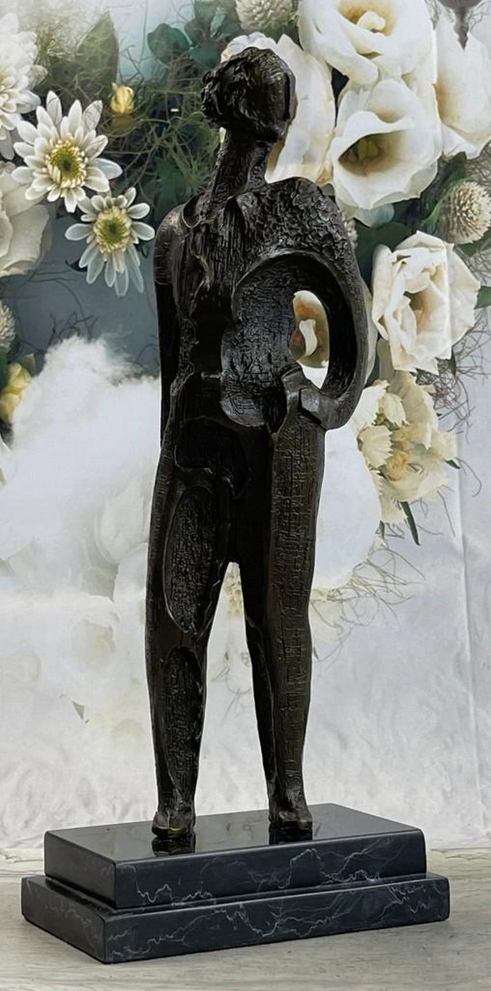 Elegant Abstract Modern Woman Bronze Sculpture Rendition by Salvador Dali: Elegant Abstract Modern Woman Bronze Sculpture Rendition by Salvador Dali. This abstract is a very odd and creative one, I guarantee you that you will have people talking about it. You can tell its a 
