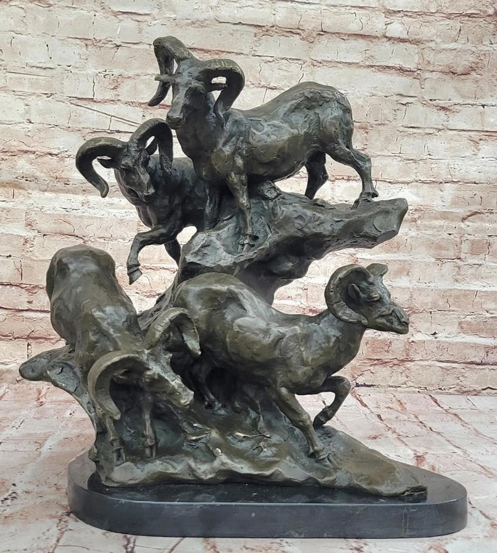 Dynamic Bronze Sculpture of Rams on Rocky Outcrop by Williams - 16.5'' x 16'': Dynamic Bronze Sculpture of Rams on Rocky Outcrop by Williams - 16.5" x 16" Celebrate the strength and majesty of nature with this stunning bronze sculpture of rams on a rocky outcrop. The