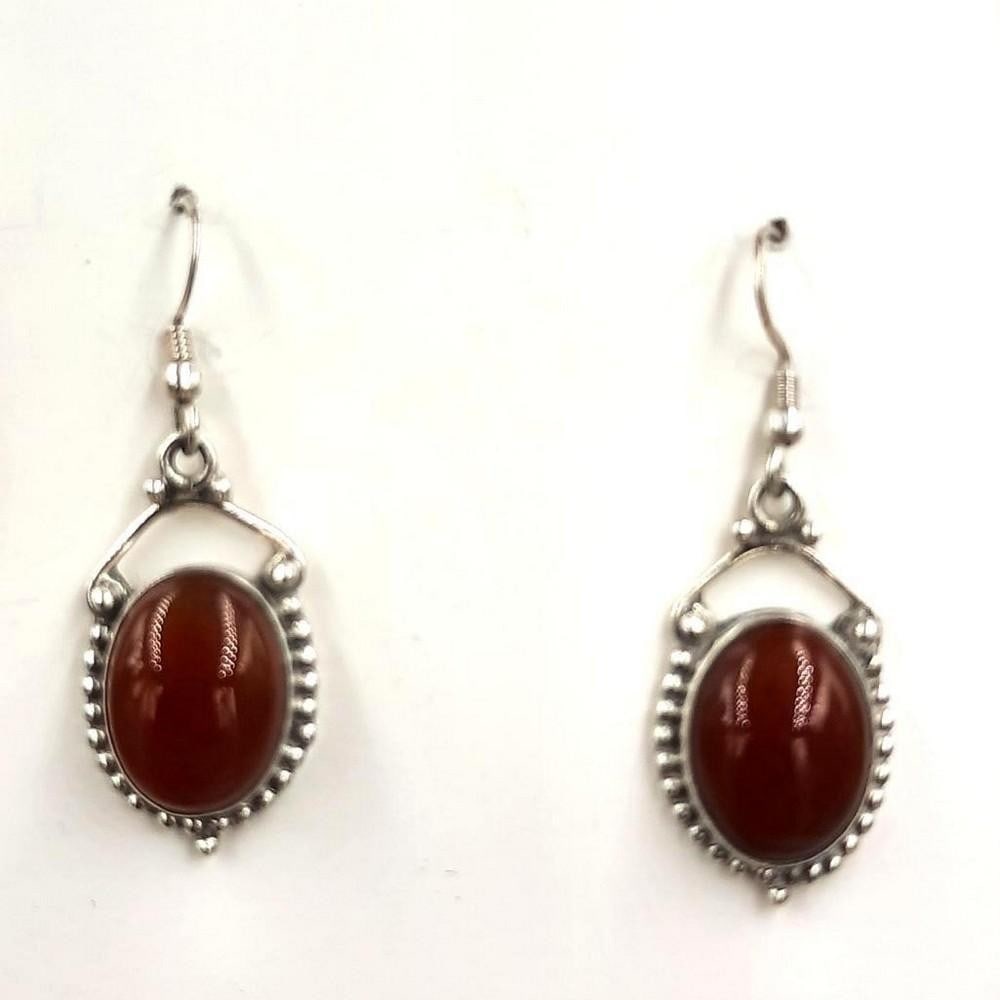 Studded Red Agate Oval Cabochon Earrings: Studded Red Agate Oval Cabochon Earrings Red agate is tied to passion, self love, and perseverance. Agate is liked to bright ideas and positive thinking, symbolizing harmony and rebalance. View Photos