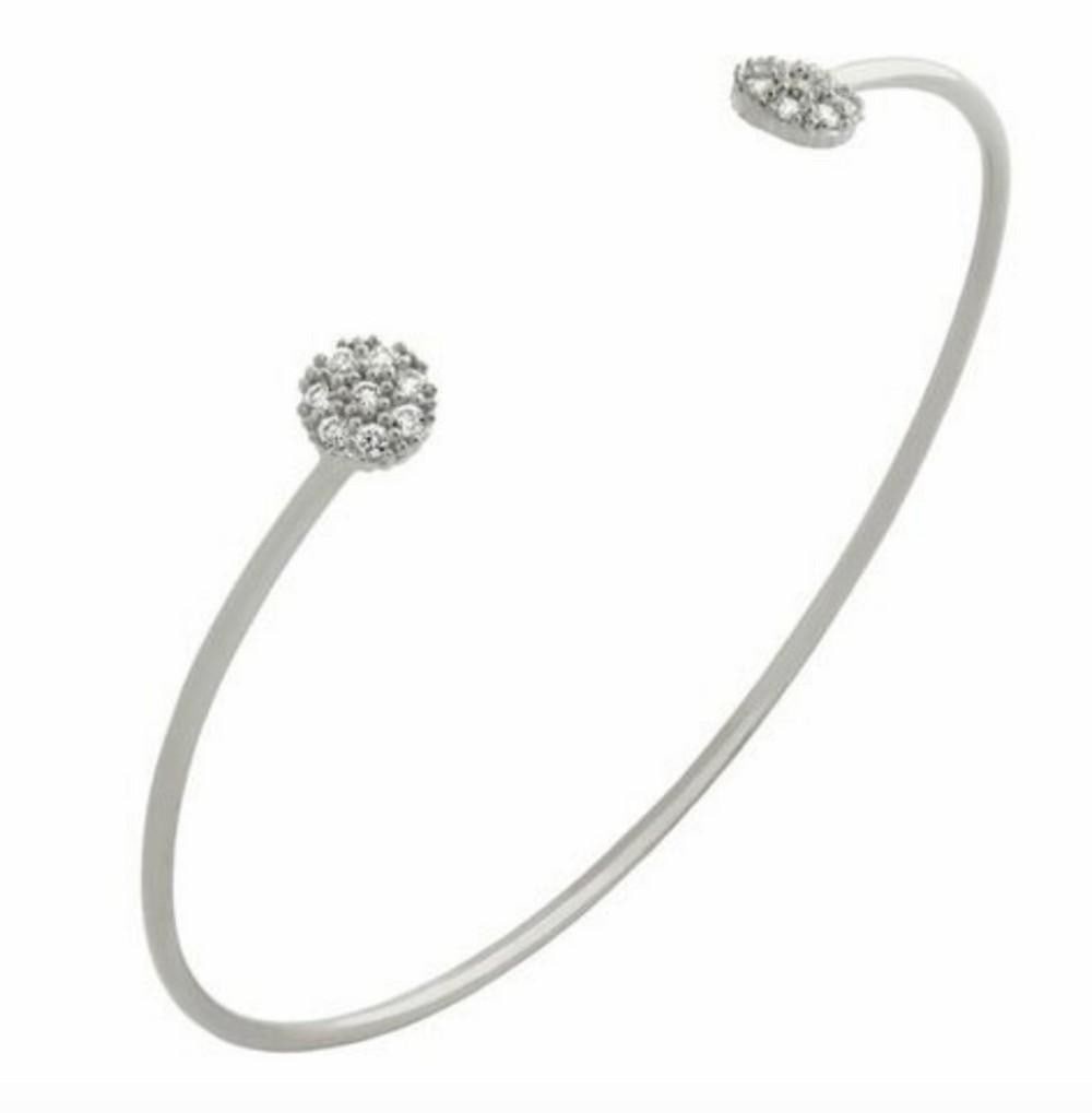 Rhodium Plated 925 Sterling Silver Dainty Bangle with Austrian Crystal Discs: Rhodium Plated 925 Sterling Silver Dainty Bangle with Austrian Crystal Discs. Dimensions: 1.5mm bangle 6mm crystal discs View Photos for Further Details.