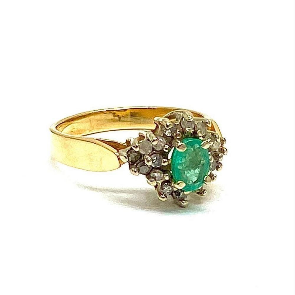B & G Marked - One of a Kind Ladies Size 7 14k Gold, Emerald and Diamond Ring: This amazing ring consists of a oval cut Emerald main stone, and is surrounded by twelve round cut diamonds, each precisely placed to bring out the Emeralds wondrous color. Please view photos for