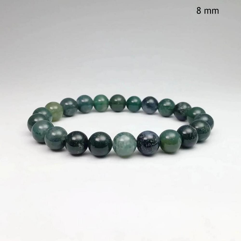 Enchanted Forest Moss Agate Beaded Bracelet: Enchanted Forest Moss Agate Beaded Bracelet Moss Agate boasts captivating mineral inclusions that artfully mimic the appearance of trees, plants, and landscapes, with some featuring unique