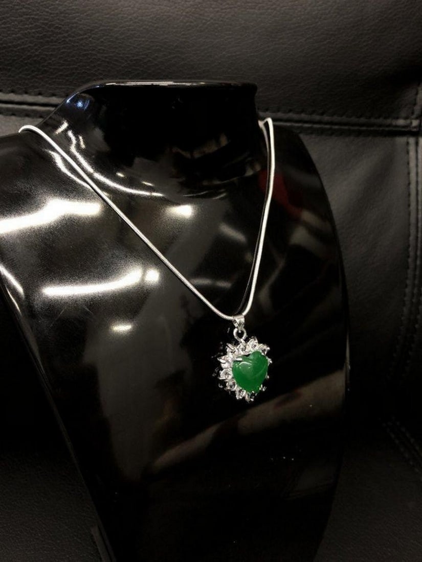 Mounted Green Jade Heart Shape Pendant On 925 Silver Plated Snake Link Necklace: Mounted Green Jade Heart Shape Pendant On 925 Silver Plated Snake Link Necklace. View Photos For Further Details.