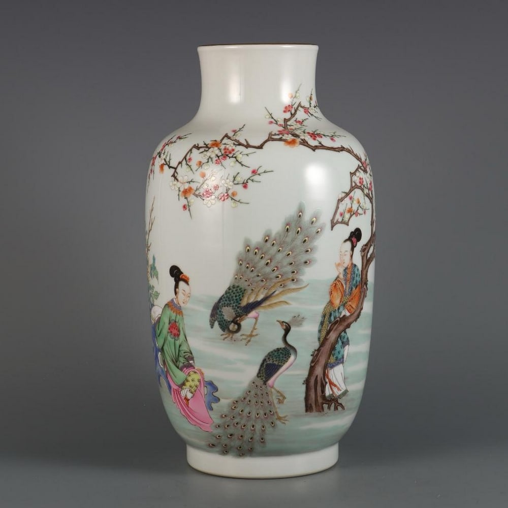 Qing Yongzheng Year Famille Rose Lady and Phoenix Picture Bottle: Qing Yongzheng Year Famille Rose Lady and Phoenix Picture Bottle A finely crafted porcelain bottle from the Yongzheng period of the Qing Dynasty, decorated in vibrant famille rose enamels. The surface