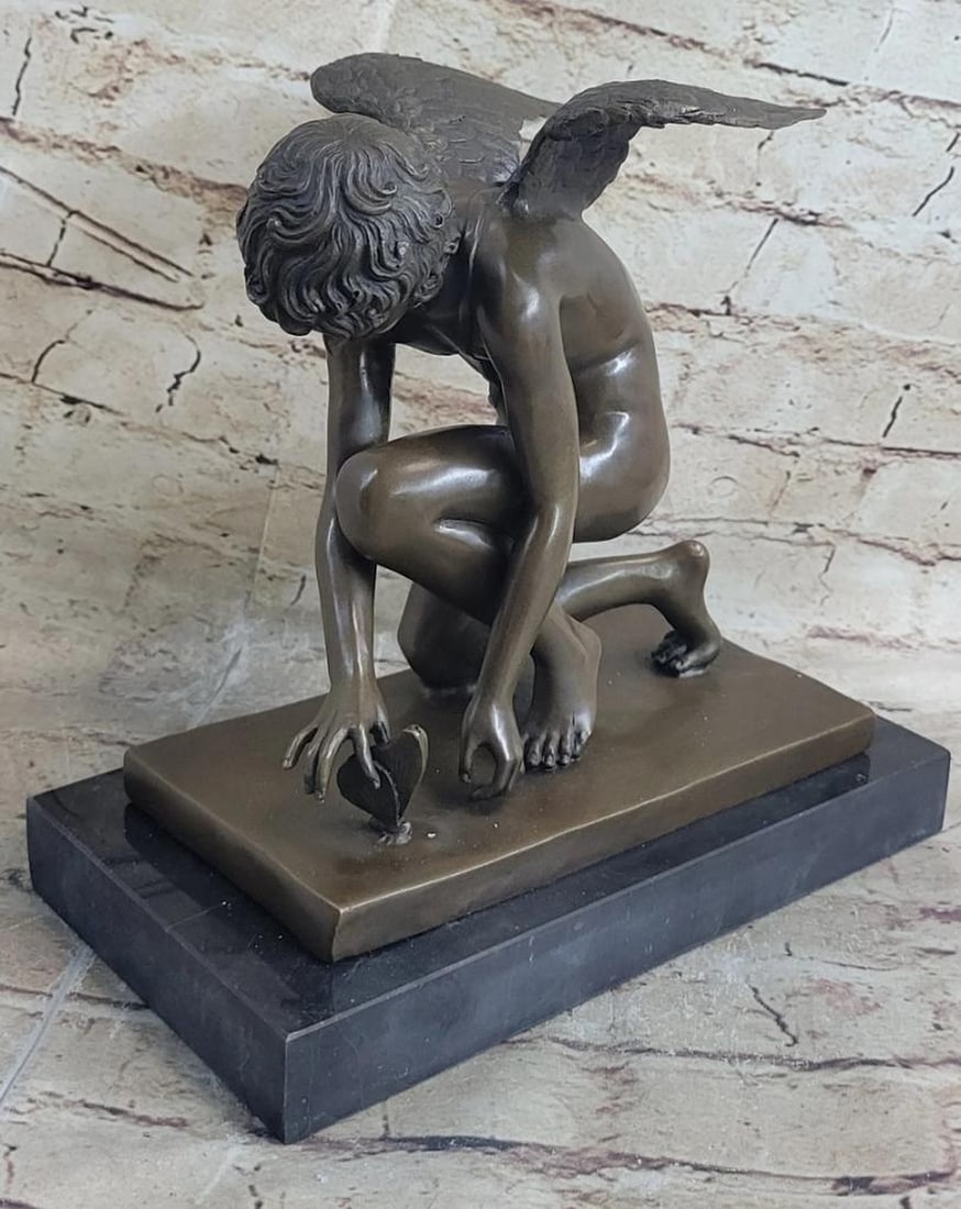 Winged Angel Cherub Cherubim Boy w/ Butterfly Bronze Statue Sculpture Figure 9" x 8.5": A really stunning piece with incredible detail by Michael Angelo makes this a must for serious collectors. Cast in bronze by the traditional hot cast or lost wax method. this is not to be confused wit