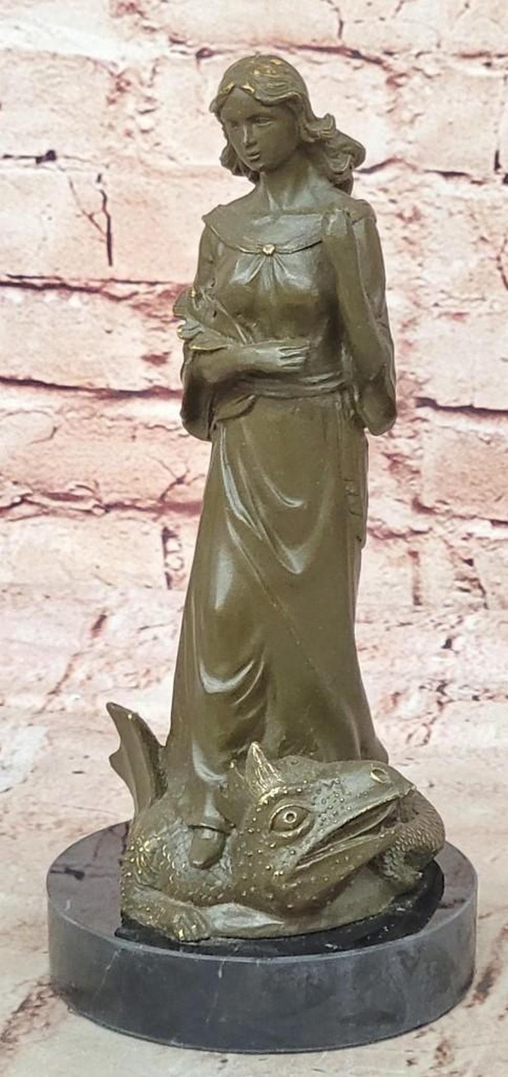 Saint Margaret of Antioch: Victory Over the Dragon Reproduction Bronze Sculpture: Saint Margaret of Antioch: Victory Over the Dragon Reproduction Bronze Sculpture This exceptional reproduction bronze statue, bearing the signature of renowned artist A. Moreau, beautifully immortaliz
