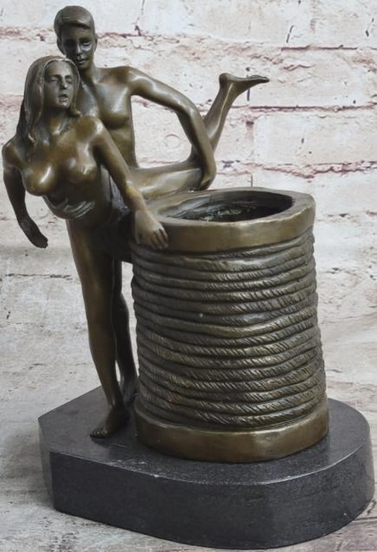 Passion’s Embrace Bronze Sculpture Pen Holder Nude Figures: Passion’s Embrace Bronze Sculpture Pen Holder Nude Figures This is an original bronze sculpture inspired by and bearing the signature of artist Mavchi. A bold fusion of functionality and sensual art