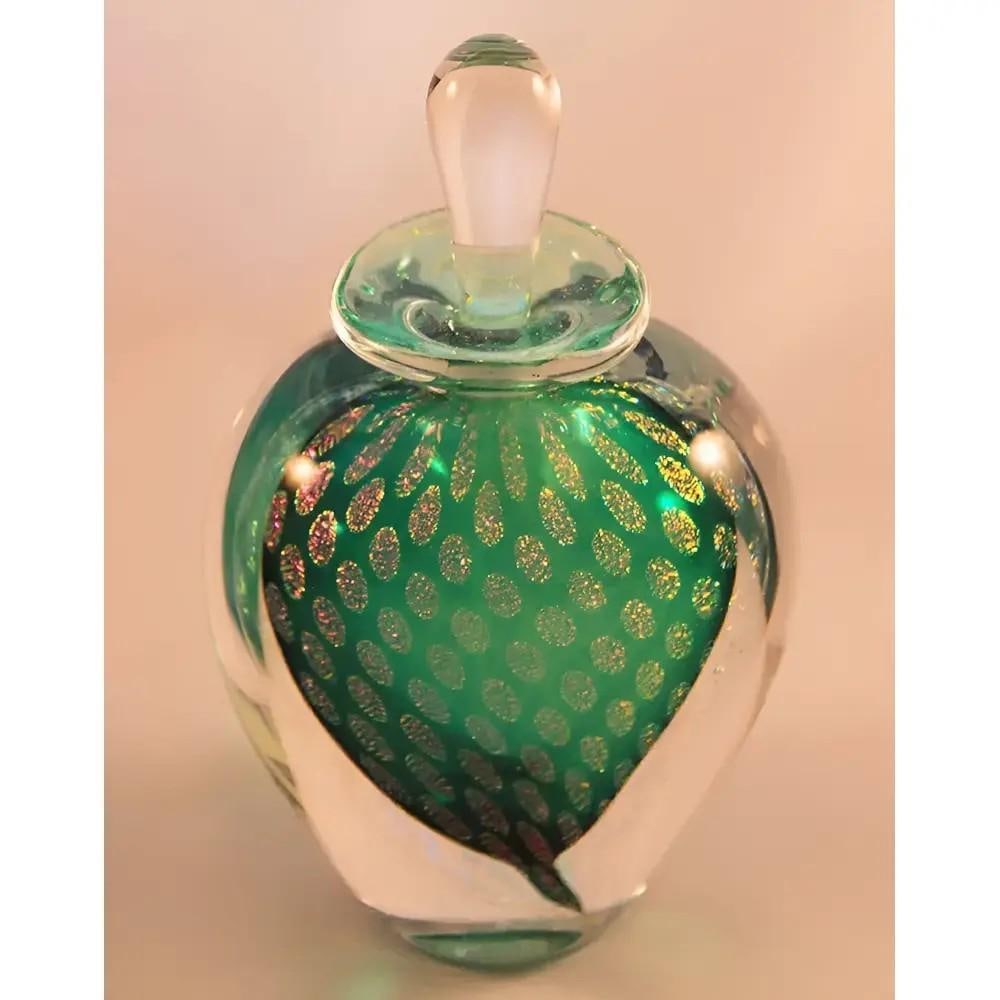 "Peacock" Green Perfume Bottle by David New-Small: "Peacock" Green Perfume Bottle by David New-Small This Canadian 'Peacock' Jade Green Perfume Bottle radiates an extraordinary iridescence, reminiscent of a peacock’s shimmering tail 