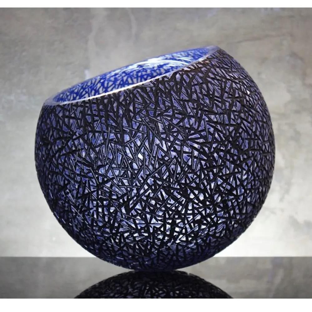 Blue Black Cuts Round Sculpture by Jan Falta: Blue Black Cuts Round Sculpture by Jan Falta Blue Black Cuts is yet another captivating round sculpture by Jan, offering a visual feast. Bold black lines crisscross the exterior of the bowl, while the
