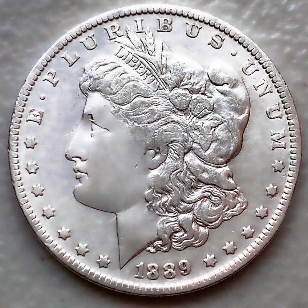1889-O GOOD DATE AU MORGAN SILVER DOLLAR: 1889-O GOOD DATE AU MORGAN SILVER DOLLAR Certification: Uncertified Circulated/Uncirculated: Circulated Year: 1889 Composition: 900 Silver Mint Location: New Orleans