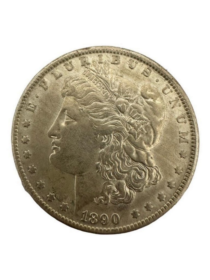 1890- O 1 Dollar "Morgan Dollar" US Coin: 1890-O 1 DOLLAR "MORGAN DOLLAR" US COIN Certification: Uncertified Circulated/Uncirculated: Circulated Year:1890 Composition: 900 Silver Mint Location: New Orle