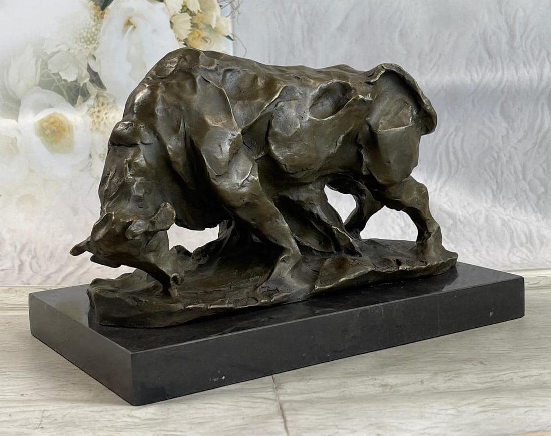 Large Abstract Modern Art Charging Bull Bronze Sculpture Marble Base Figurine: This magnificent modern and abstract sculpture is of a charging bull. With his head down, his nostrils` flared and his muscles tightened he rears up to stomp the ground before him, releasing a vib