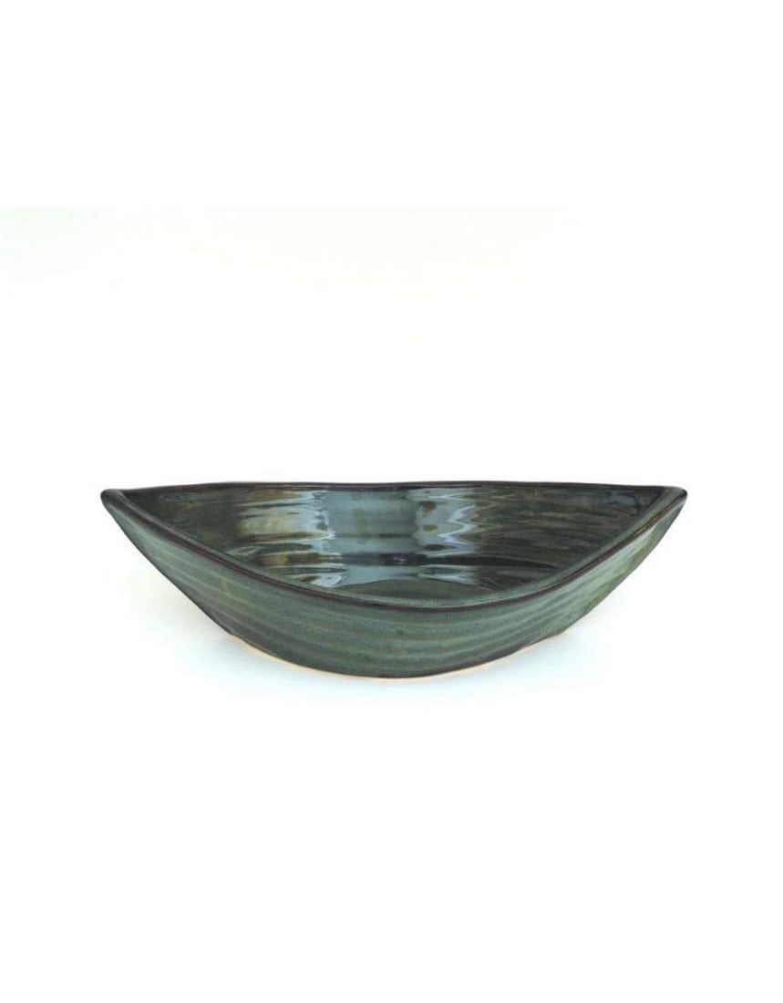 Sage Dory Serving Bowl: Sage Dory Serving Bowl The Sage Dory Serving Bowl features a serene, earthy green tone that complements a variety of table settings. Its spacious design makes it ideal for serving salads, pasta, or