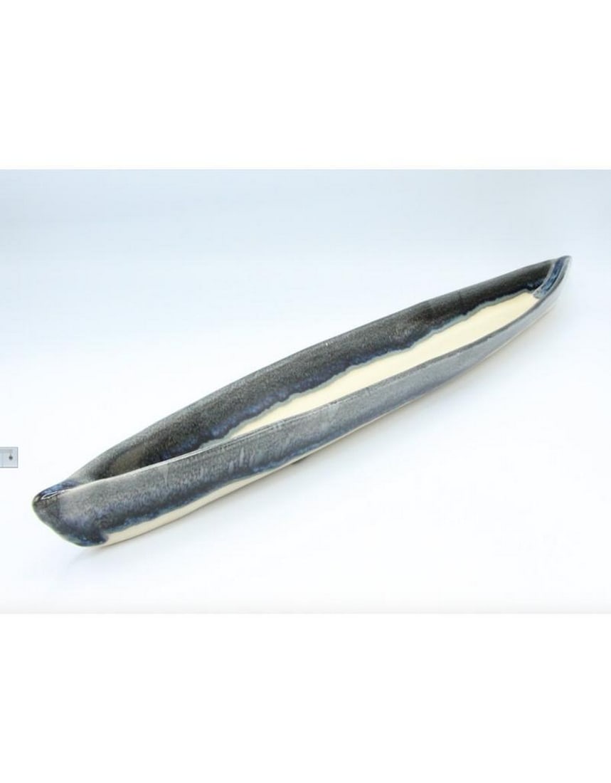 Granite Kayak Appetizer Server: Granite Kayak Appetizer Server This piece is perfect for serving appetizers! Arrange your favorite cheeses, olives, crackers, and more for a beautiful presentation that will impress your guests.