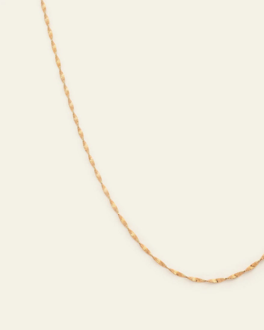 14k Vermeil Gold Plated Women's Singapore Chain: 14k Vermeil Gold Plated Women's Singapore Chain This 14K vermeil gold-plated Singapore chain showcases a twisted, interwoven design that catches the light beautifully. Its intricate craftsmanship