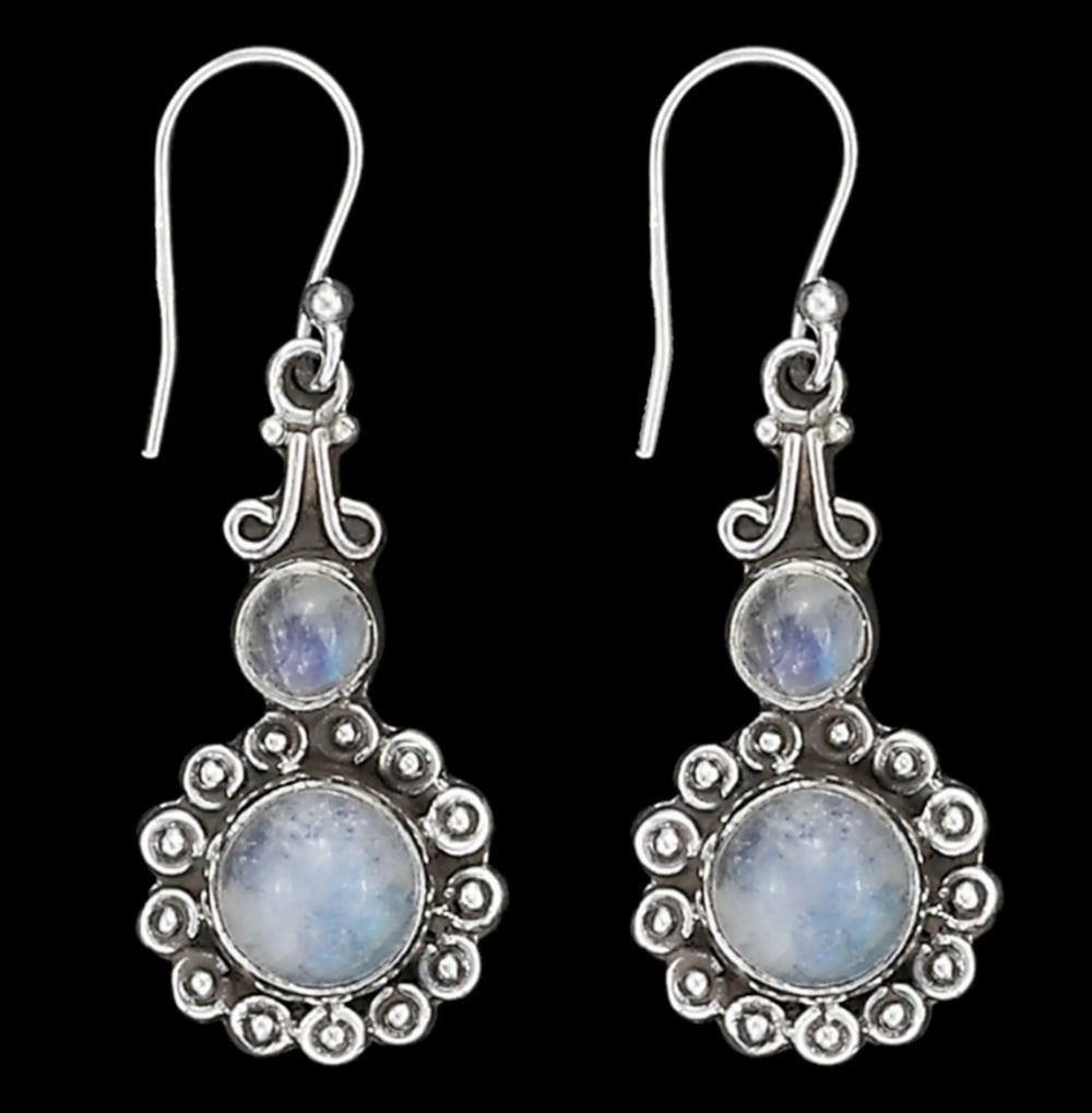 Celestial Grace Silver Earrings: Celestial Grace Silver Earrings Enhance your look with these elegant sterling silver earrings featuring mesmerizing rainbow moonstones. Their sleek design, paired with the moonstones’ enchanting