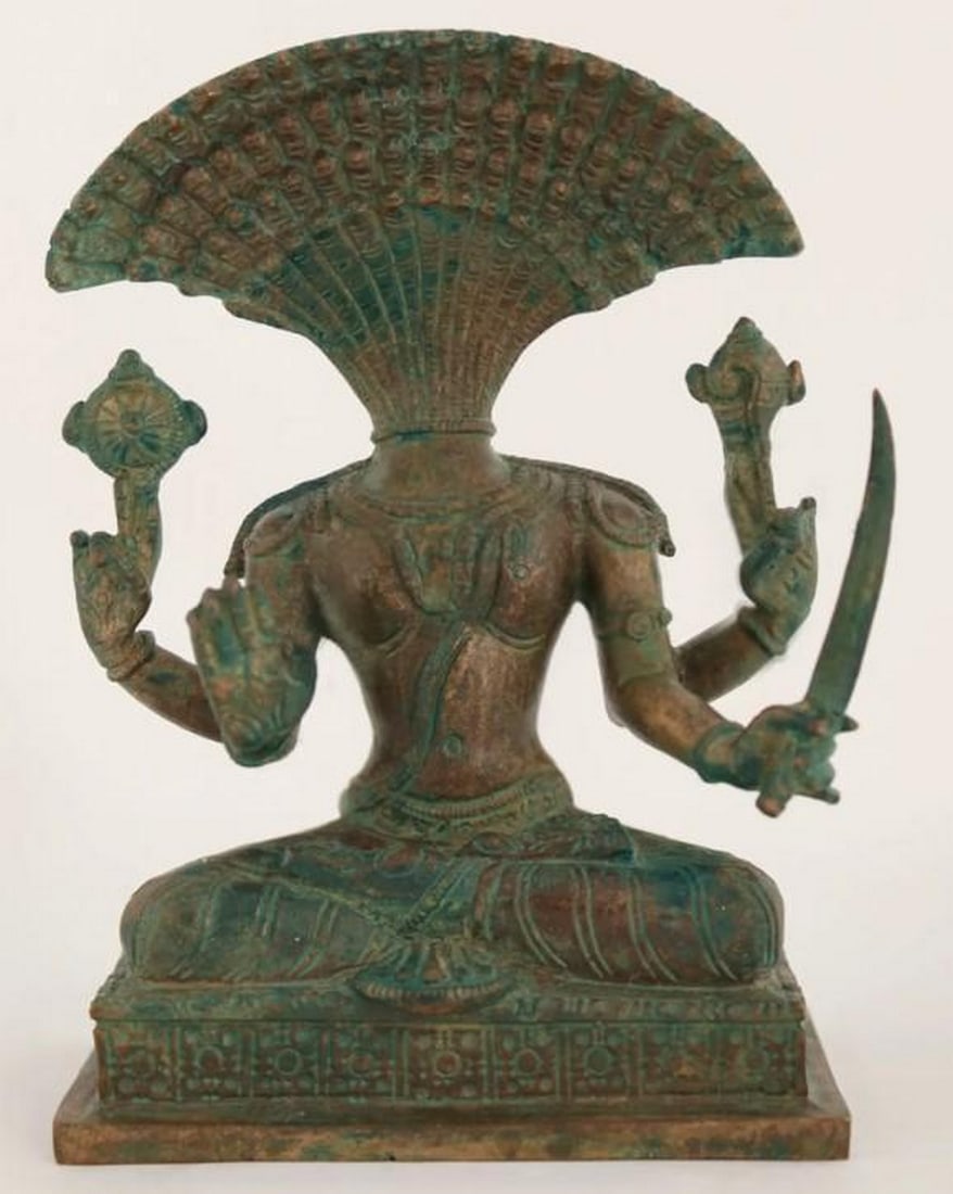 5" Patina Maharshi Patanjali Bronze Statue: 5" Patina Maharshi Patanjali Bronze Statue Crafted in bronze with a rich patina finish, this statue of Maharshi Patanjali embodies wisdom and serenity. Depicting the revered sage in a meditative p