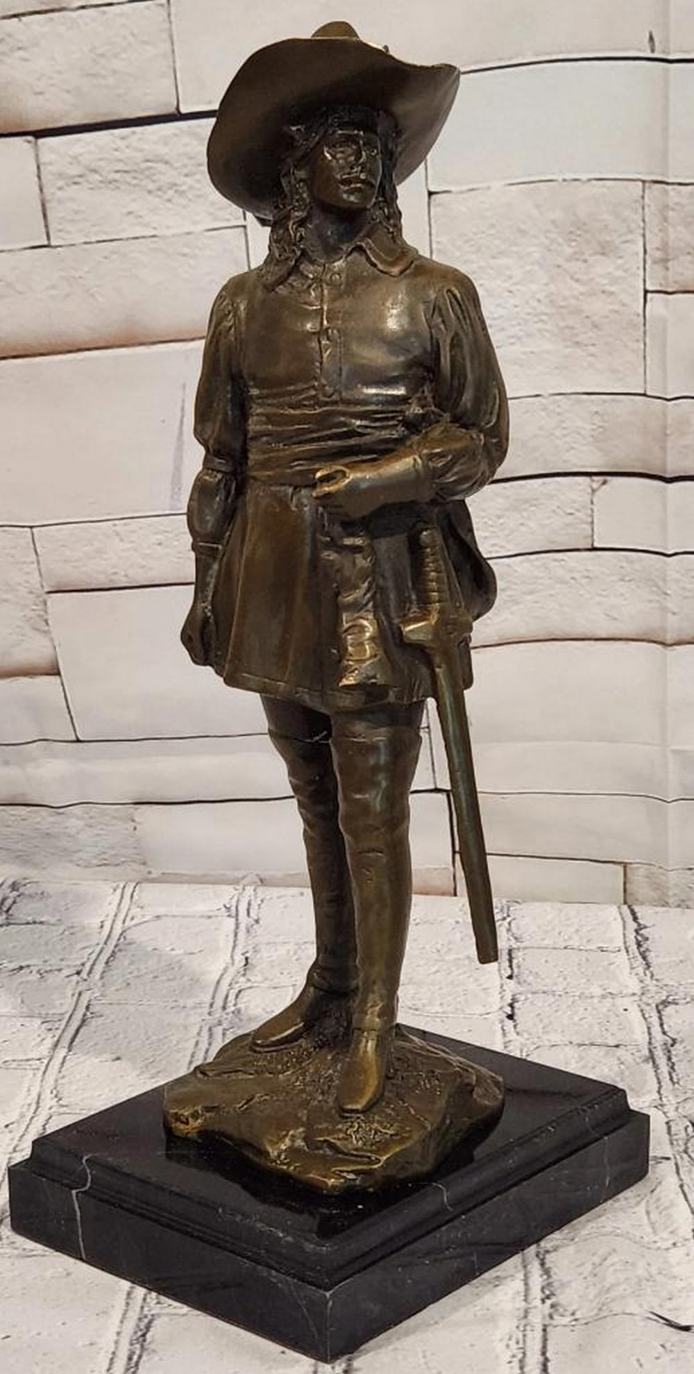 Miguel Lopez Musketeer Original Bronze Sculpture - 13.5" x 6": Miguel Lopez Musketeer Original Bronze Sculpture - 13.5" x 6" This bronze sculpture depicts a musketeer in a composed and upright stance, reflecting themes of historical character and formalit