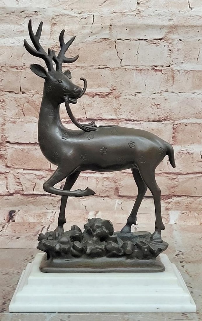 Milo Signed Deer Bronze Sculpture on Marble Base – 11" x 7.5": Milo Signed Deer Bronze Sculpture on Marble Base – 11" x 7.5" This hand made bronze sculpture by Milo captures the quiet elegance and natural grace of a deer, with a poised stance and refine