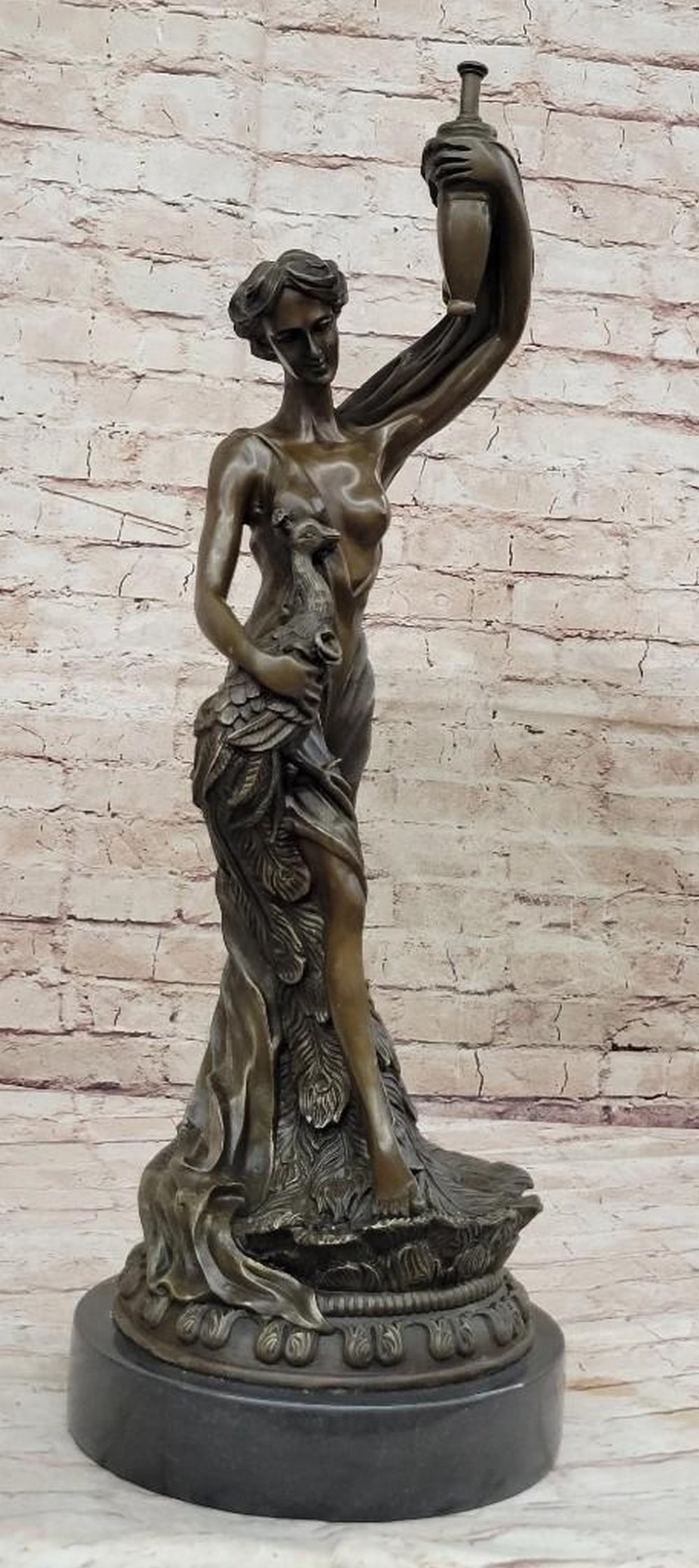 Moreau Inspired Semi Nude Venus Holding a Peacock Bronze Sculpture: Moreau Inspired Semi Nude Venus Holding a Peacock Bronze Sculpture Experience the timeless allure of classical art with this exquisite bronze sculpture of Semi Nude Venus Holding a Peacock. Inspired b