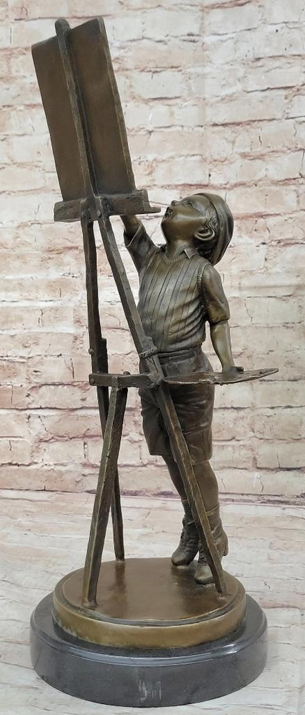 The Young Visionary – Bronze Artist Sculpture by Jim Davidson on Marble Base – 21.5" x 8.5": The Young Visionary – Bronze Artist Sculpture by Jim Davidson on Marble Base – 21.5" x 8.5" This original bronze sculpture by Jim Davidson portrays a young boy fully immersed in creating a