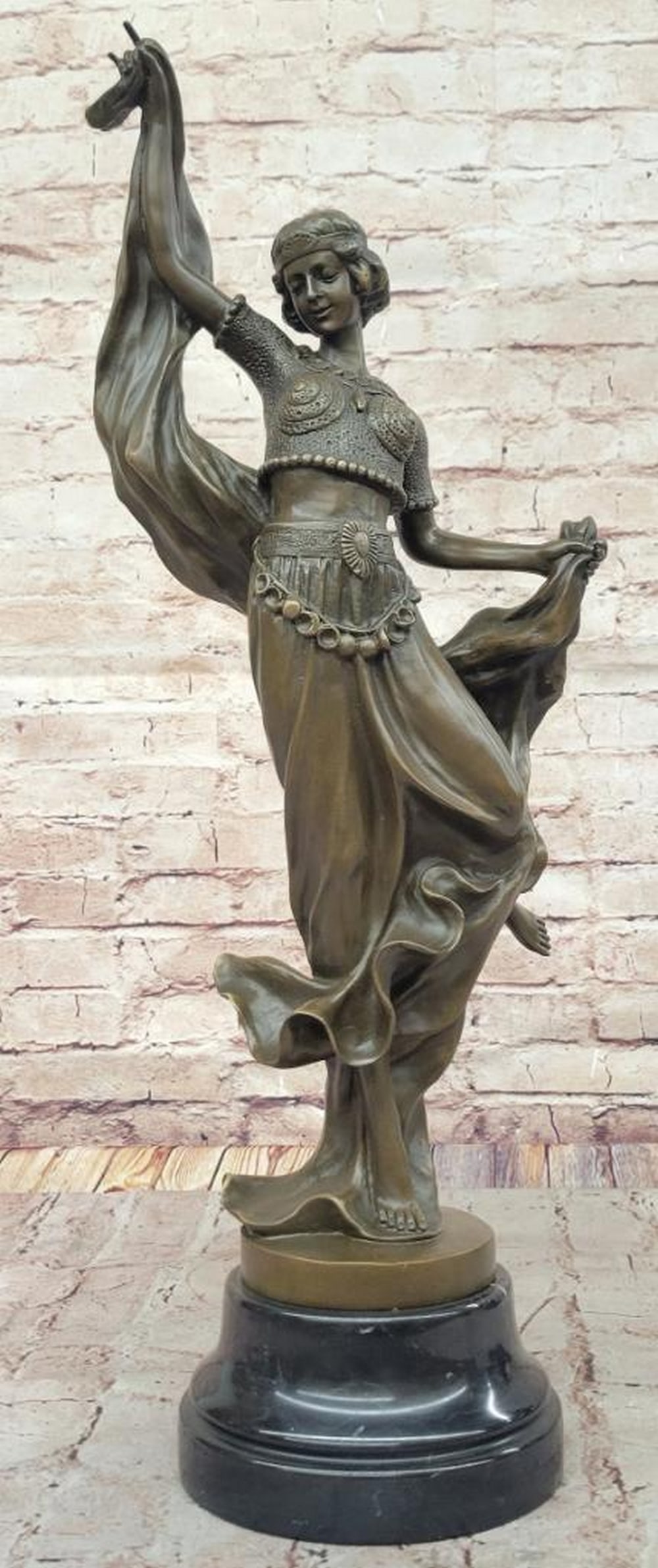 Art Deco Dancing Woman Bronze Sculpture by D. Gonon - 23.5" x 12": Art Deco Dancing Woman Bronze Sculpture by D. Gonon - 23.5" x 12" This elegant Art Deco bronze sculpture by D. Gonon captures the fluid grace and dynamism of a female dancer in mid-performance
