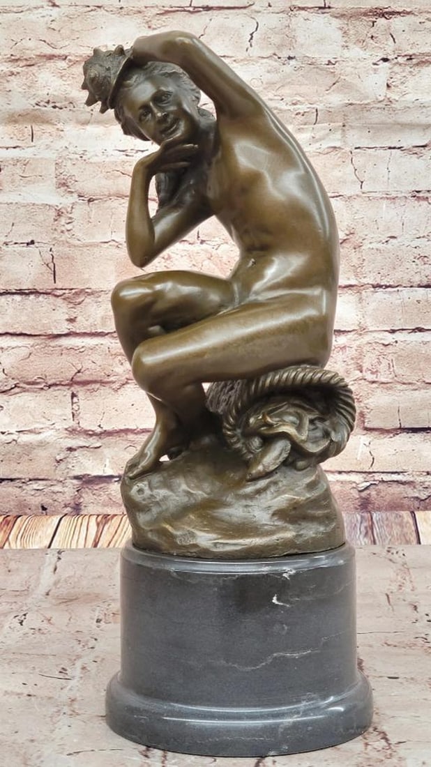 Seated Nude with Basket of Fish Inspired Bronze Sculpture - 15" x 6": Seated Nude with Basket of Fish Inspired Bronze Sculpture - 15" x 6" Inspired by the elegance of Jean-Baptiste Carpeaux, this exquisite bronze sculpture depicts a seated nude figure atop a bas