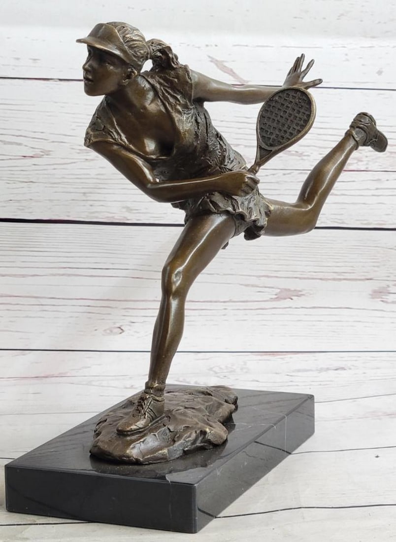 Original Female Tennis Player Bronze Sculpture - 10" x 10": Original Female Tennis Player Bronze Sculpture - 10" x 10" She comes in with full force as she swings her racket hard. She makes contact with the ball and follows through with the rest of her 