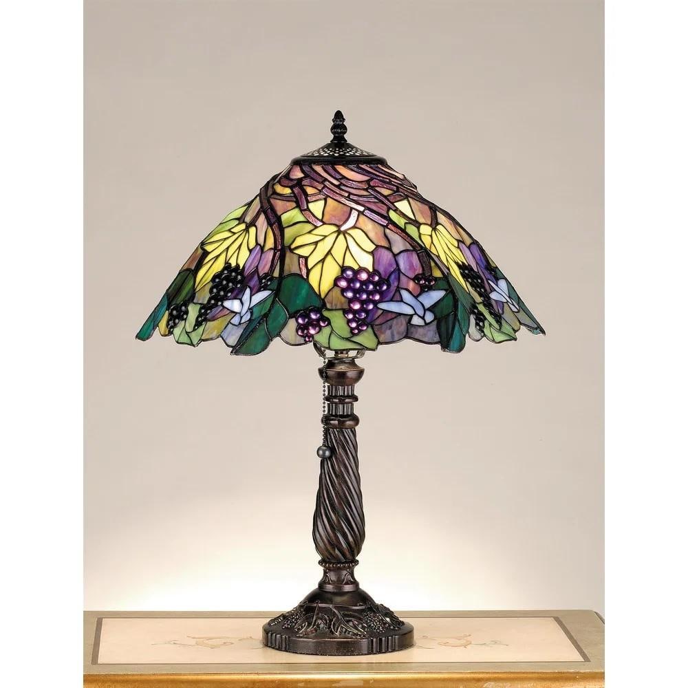 Bluebird Vineyard Tiffany Accent Lamp: Bluebird Vineyard Tiffany Accent Lamp This 22-inch hand-crafted Tiffany accent lamp depicts a bluebird in flight above spiraling grape vines, green leaves, and purple jewel-like grapes. The art glass 