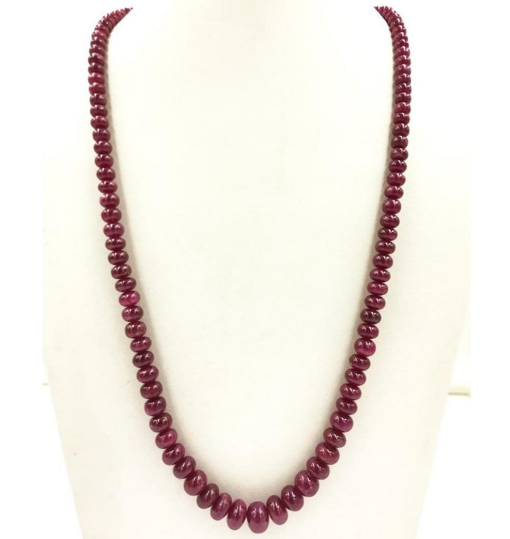 20" Scarlet Ruby Plain Beads String: 20" Scarlet Ruby Plain Beads String Introducing our Scarlet Ruby Plain Beads String, a captivating necklace that not only radiates timeless elegance and bold sophistication but also harnesses the
