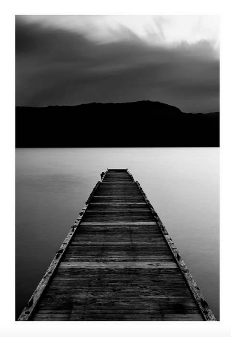 Black & White Wooden Pier Poster Print: Black & White Wooden Pier Poster Print The poster has a 'built-in' mount which elegantly frames the image. Dimensions: 50cm x 70cm View Photos For Further Details.