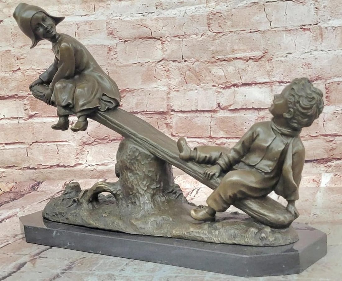 J. Daste Bronze Sculpture “Joy?? of Children on Seesaw – 11" x 15": J. Daste Bronze Sculpture “Joy” of Children on Seesaw – 11" x 15" This bronze sculpture depicts two children playing on a seesaw, rendered with attention to proportion, balance, and 