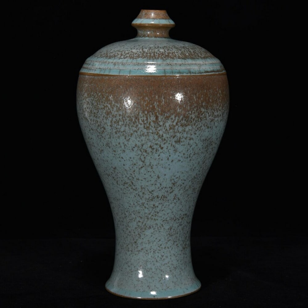 Chinese Style Ru Kiln Sky Blue Glazed Plum Vase: Chinese Style Ru Kiln Sky Blue Glazed Plum Vase This vase features a sky blue glaze in a Ru kiln style with a plum-shaped form. The surface displays a smooth, even finish with subtle tonal variation, 