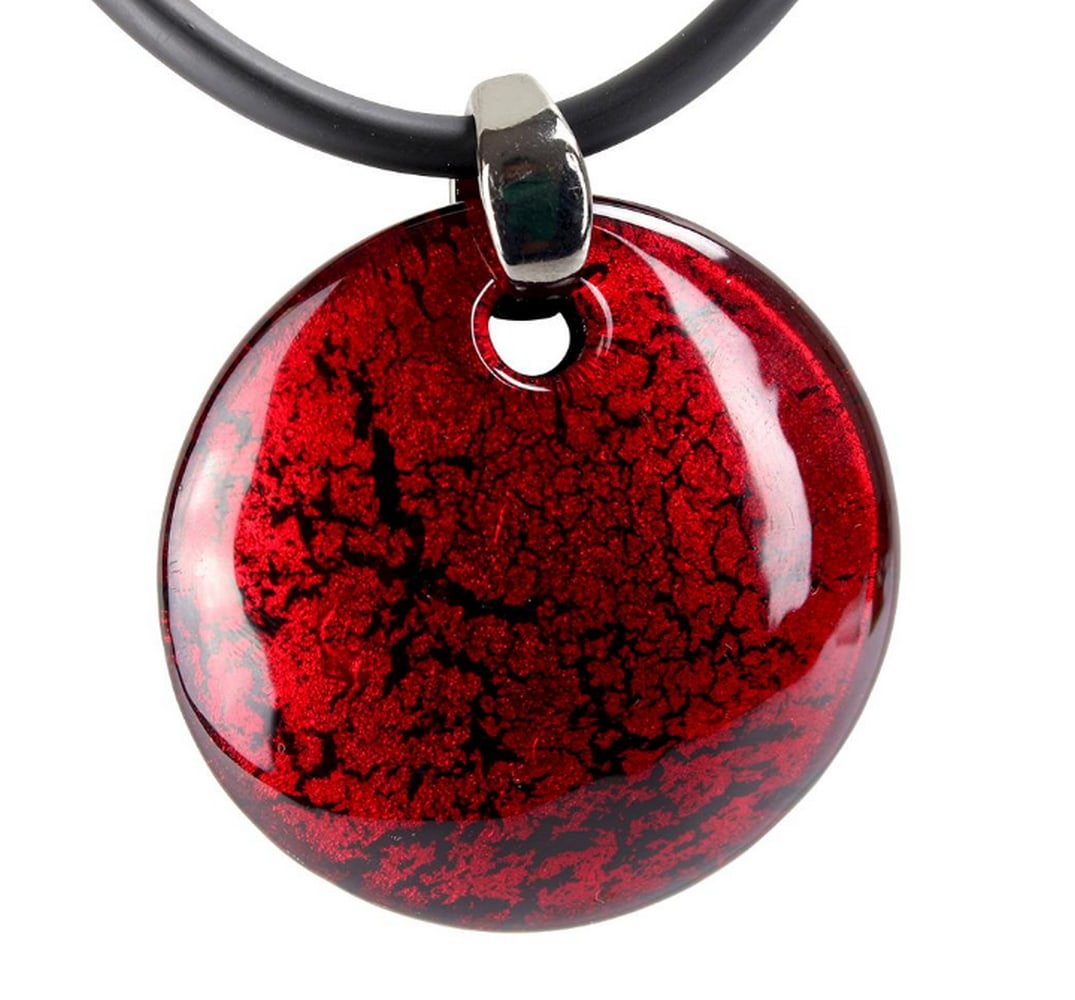 Red Murano Glass Pendant Necklace: Red Murano Glass Pendant Necklace Handcrafted Murano glass pendant featuring a silver leaf encased in submerged glass, offering a simple yet distinctive style. An ideal gift for any woman or girl who 