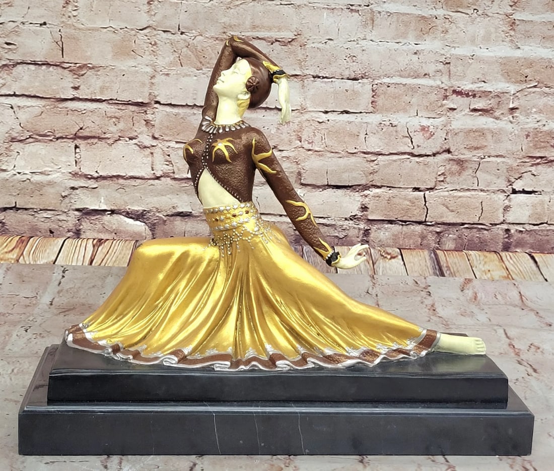 Chiparus Dancer in Long Skirt Inspired Bronze Statue - 12" x 14.5": Chiparus Dancer in Long Skirt Inspired Bronze Statue - 12" x 14.5" This elegant bronze sculpture, titled "Dancer in a Long Skirt," is a finely crafted work of art signed by the celebra